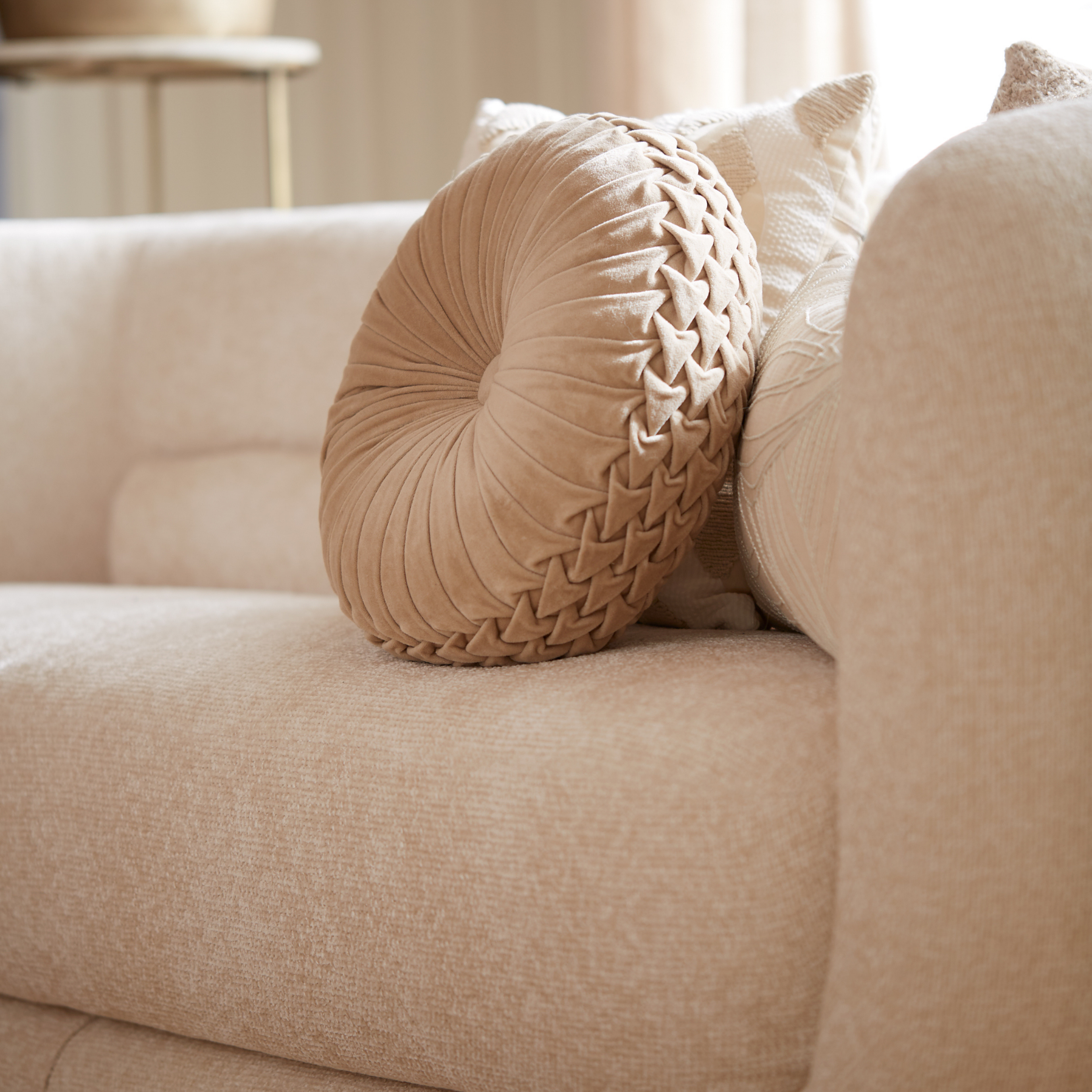 Serenity Curved Three Seater Modern Fabric Sofa in Ivory Cream close up
